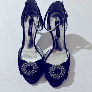 Satin black evening shoes by Nina/New York.